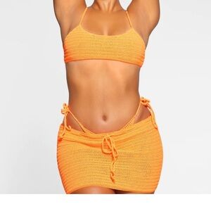 Skims crochet mini swim skirt